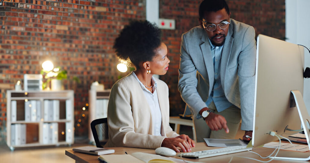 business people in an office collaboration on an ecommerce design